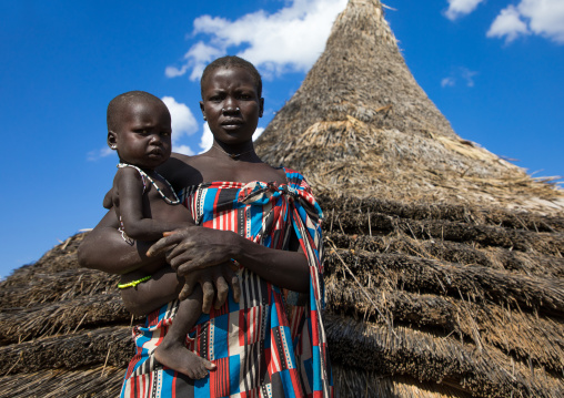 Larim tribe woman carrying her baby, Boya Mountains, Imatong, South Sudan