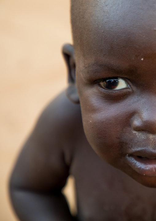 Half face of a Larim tribe baby, Boya Mountains, Imatong, South Sudan