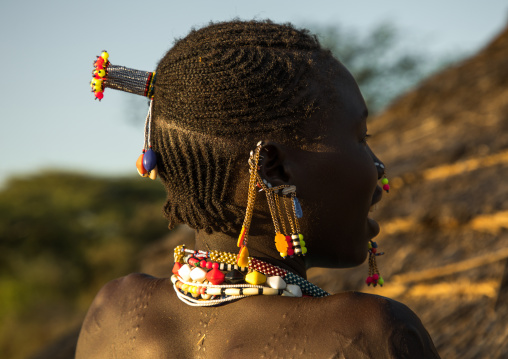 Portrait of a Larim tribe woman with traditional eaerrings, Boya Mountains, Imatong, South Sudan