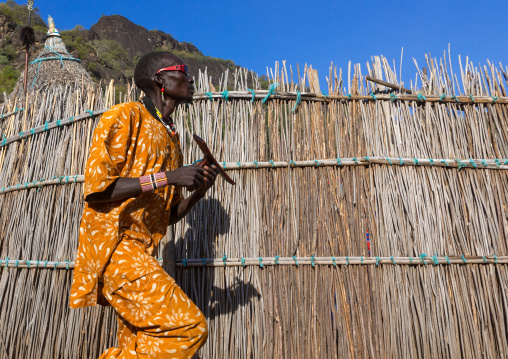 Larim tribe man dancing during a wedding ceremony, Boya Mountains, Imatong, South Sudan