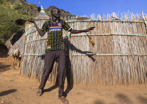 Larim tribe man dancing during a wedding ceremony, Boya Mountains, Imatong, South Sudan