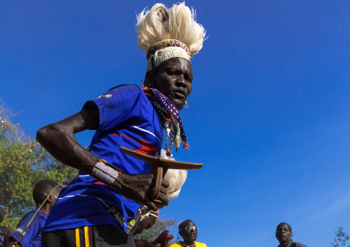 Larim tribe men dancing during a wedding ceremony, Boya Mountains, Imatong, South Sudan