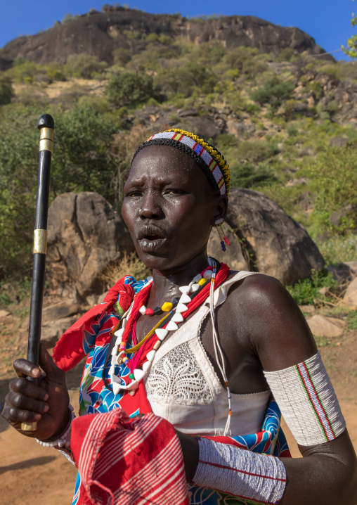 Larim tribe woman dancing during a wedding celebration, Boya Mountains, Imatong, South Sudan