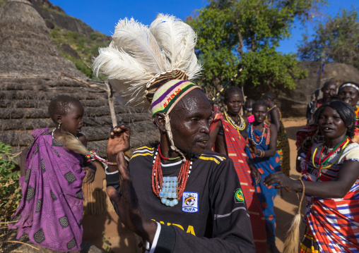 Larim tribe men and women dancing during a wedding celebration, Boya Mountains, Imatong, South Sudan