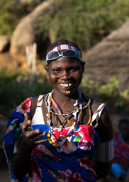Smiling Larim tribe woman during a wedding celebration, Boya Mountains, Imatong, South Sudan
