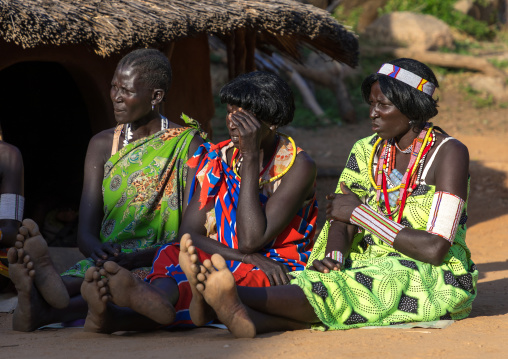 Larim tribe women sit during a wedding ceremony, Boya Mountains, Imatong, South Sudan