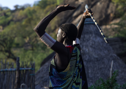 Larim tribe woman dancing during a wedding celebration, Boya Mountains, Imatong, South Sudan