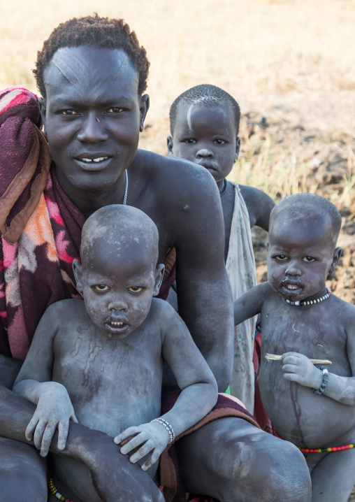 Mundari tribe father with his children, Central Equatoria, Terekeka, South Sudan