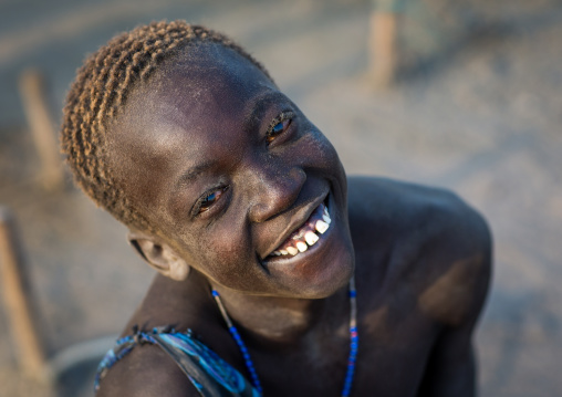 Portrait of a smiling Mundari tribe boy, Central Equatoria, Terekeka, South Sudan