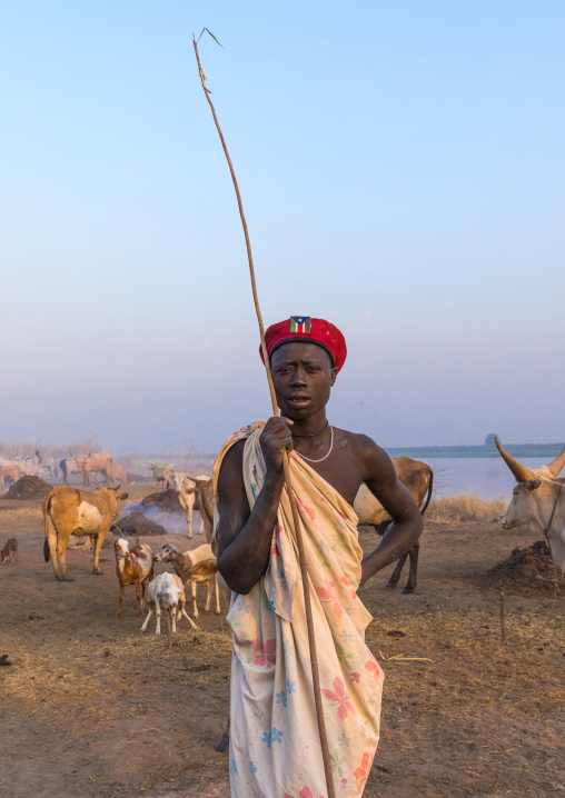 Mundari tribe man with a red beret in a cattle camp, Central Equatoria, Terekeka, South Sudan