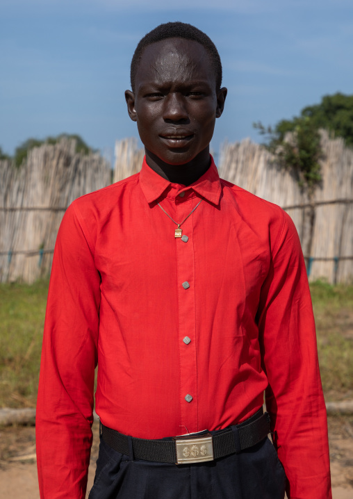 Portrait of a Mundari tribe man dressed with western clothes for the sunday mass, Central Equatoria, Terekeka, South Sudan