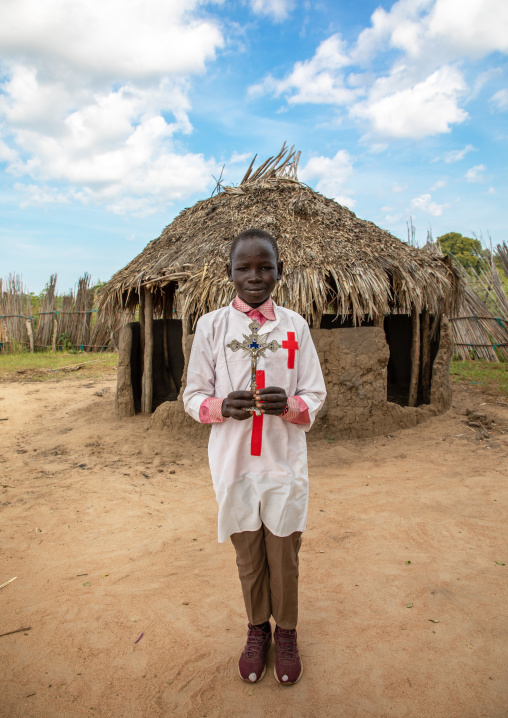 Mundari tribe choirboy holding a cross, Central Equatoria, Terekeka, South Sudan
