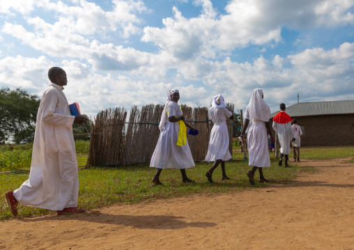Mundari tribe nuns and priest going to the church during a sunday mass, Central Equatoria, Terekeka, South Sudan