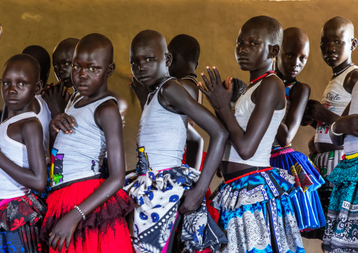 Mundari tribe girls dancing and singing during a sunday mass in a church, Central Equatoria, Terekeka, South Sudan
