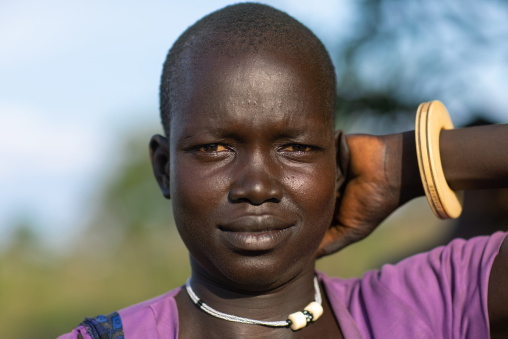 Portrait of a Mundari tribe woman with an ivory bracelet, Central Equatoria, Terekeka, South Sudan