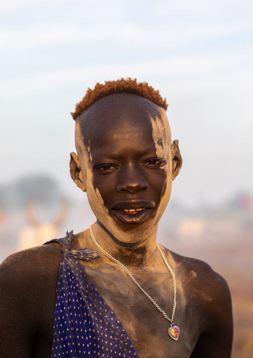 Mundari tribe boy covered in ash to protect from the mosquitoes and flies, Central Equatoria, Terekeka, South Sudan