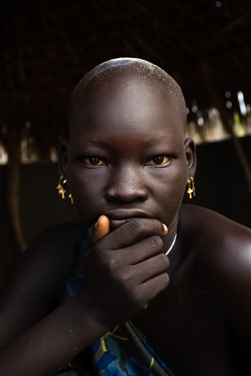 Portrait of a beautiful Mundari tribe teenage girl, Central Equatoria, Terekeka, South Sudan