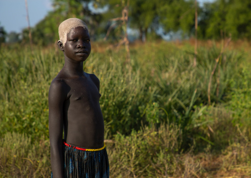 Portrait of a Mundari girl with ash on the head to dye her hair in red, Central Equatoria, Terekeka, South Sudan