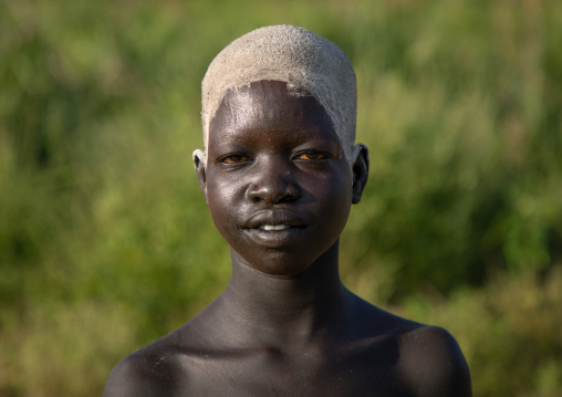 Portrait of a Mundari girl with ash on the head to dye her hair in red, Central Equatoria, Terekeka, South Sudan