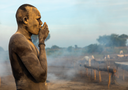 Mundari tribe man covered in ash to repel flies and mosquitoes, Central Equatoria, Terekeka, South Sudan
