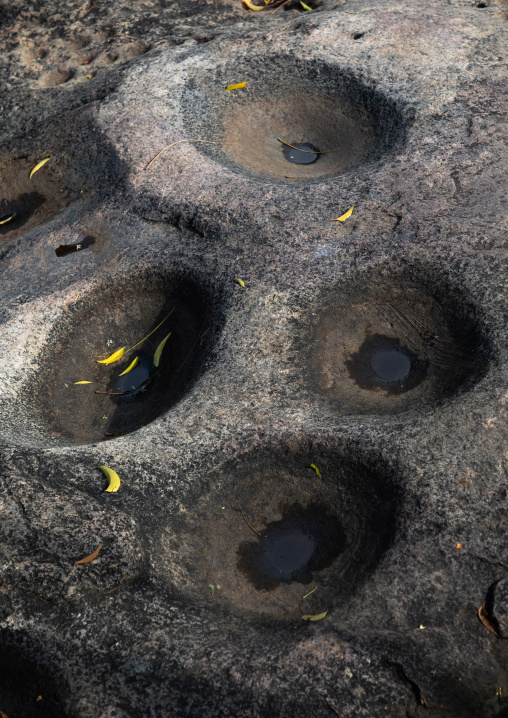 Rock used to grind grains in Lotuko tribe, Central Equatoria, Illeu, South Sudan