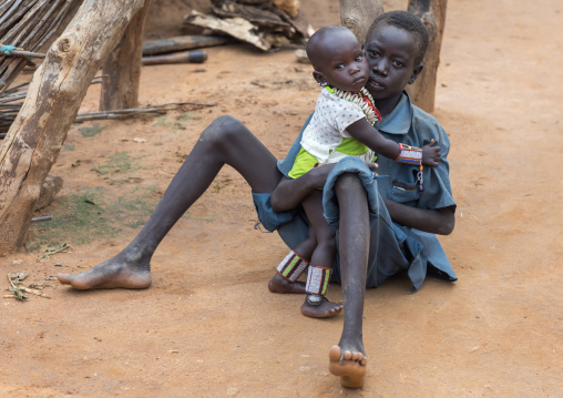 Larim tribe boy with a little girl, Boya Mountains, Imatong, South Sudan