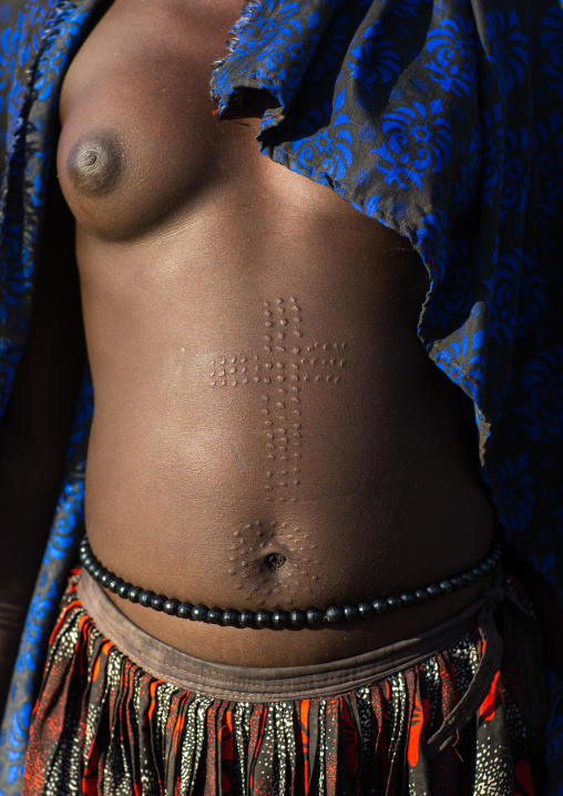 Mundari tribe woman scarifications on the belly in a cross shape, Central Equatoria, Terekeka, South Sudan