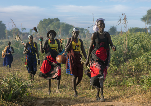 Mundari tribe women marching in line while celebrating a wedding, Central Equatoria, Terekeka, South Sudan