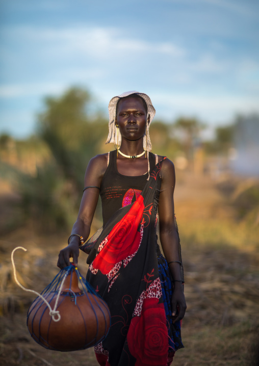Portrait of a Mundari tribe woman with a calabash, Central Equatoria, Terekeka, South Sudan