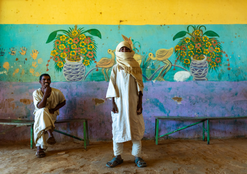 Sudanese boy in a restaurant with decorated walls, Khartoum State, Khartoum, Sudan