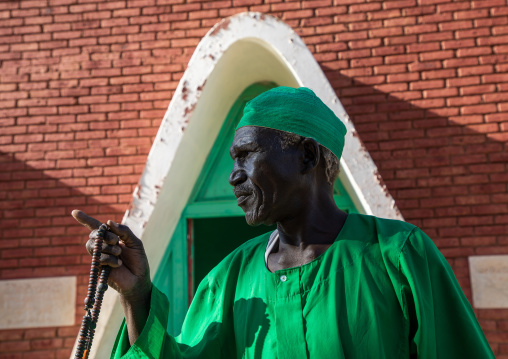 Sufi dervish in green clothes, Al Jazirah, Abu Haraz, Sudan