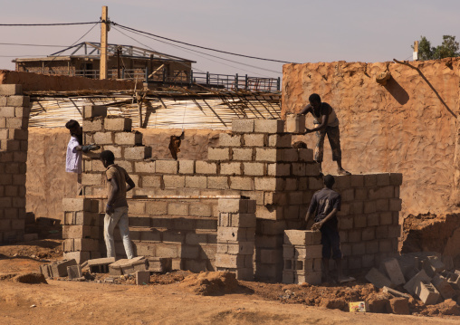 Sudanese men building a house in a village, Khartoum State, Omdurman, Sudan
