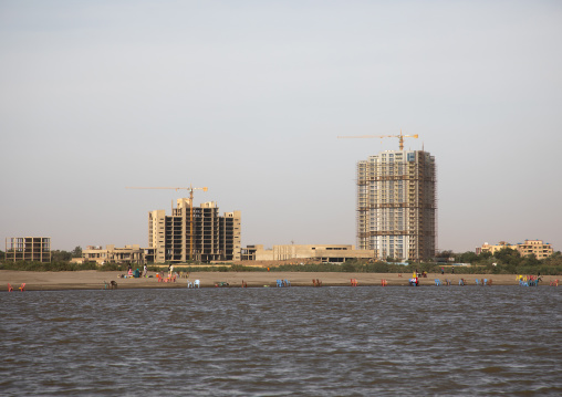 Cranes on a construction site on the bansk of river Nile, Khartoum State, Khartoum, Sudan