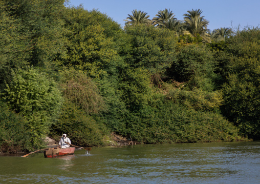Fisherman in a boat on river Nile, Northern State, El-Kurru, Sudan