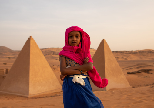 Portrait of sudanese girl visiting the pyramids of the kushite rulers at Meroe, Northern State, Meroe, Sudan