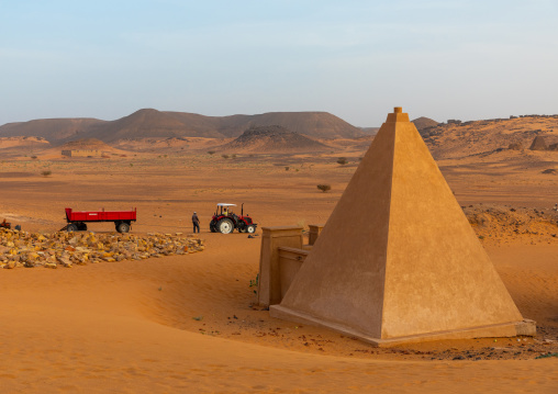 Workers making renovation in the reconstructed pyramids of the kushite rulers at Meroe, Northern State, Meroe, Sudan
