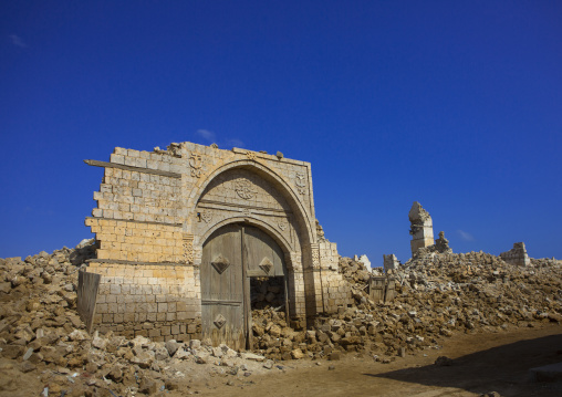 Sudan, Port Sudan, Suakin, wodden door in the middle of a ruined ottoman coral buildings