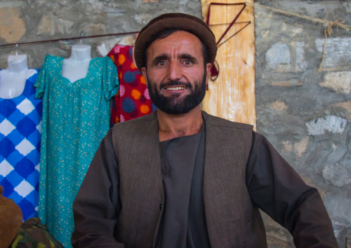 Portrait of a smiling afghan man in the market border with Afghanistan, Central Asia, Ishkashim, Tajikistan