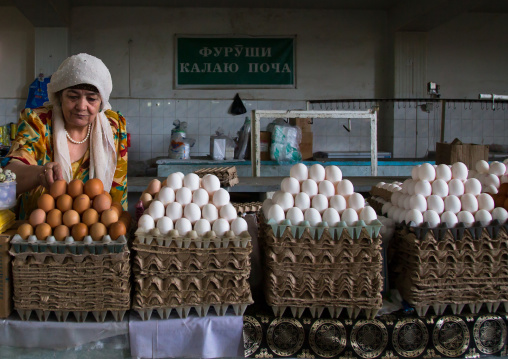 Old tajik woman selling eggs in a local market, Gorno-Badakhshan autonomous region, Khorog, Tajikistan