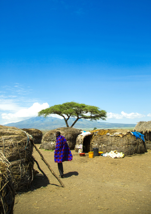 Tanzania, Ashura region, Ngorongoro Conservation Area, maasai man outside his home