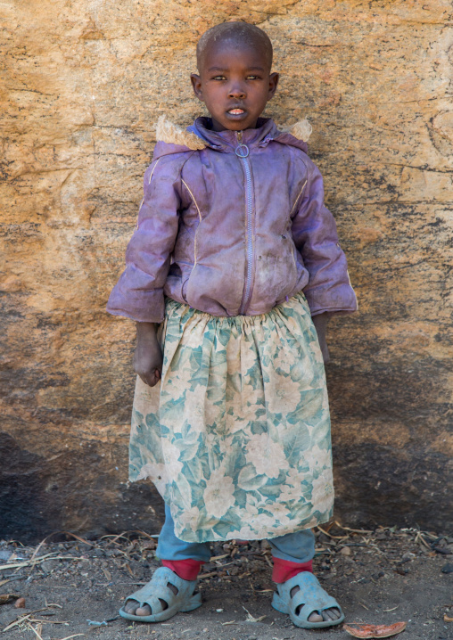 Tanzania, Serengeti Plateau, Lake Eyasi, hadzabe tribe girl with modern clothes