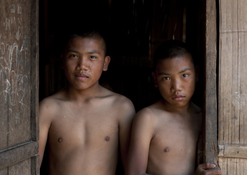Twins boys called ja tor and ja lae, Black lahu twins, Thailand