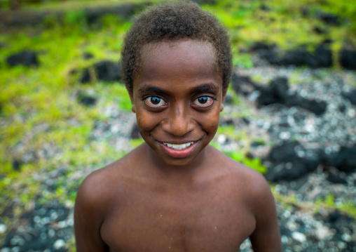 Portrait of a smiling child with Big eyes, Malampa Province, Ambrym island, Vanuatu