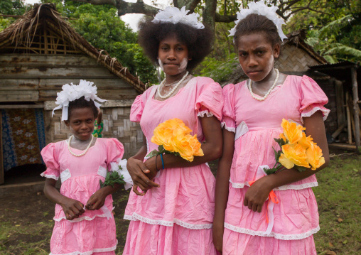 Bridesmaids wearing matching pink patterned dresses, Malampa Province, Ambrym island, Vanuatu