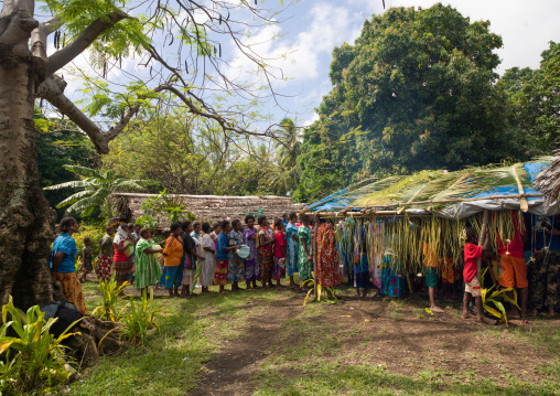 Women queueing to offer gifts to the bride and the groom during a traditional wedding, Malampa Province, Ambrym island, Vanuatu