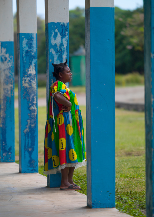 Woman in colorful dress looking away, Tanna island, Epai, Vanuatu