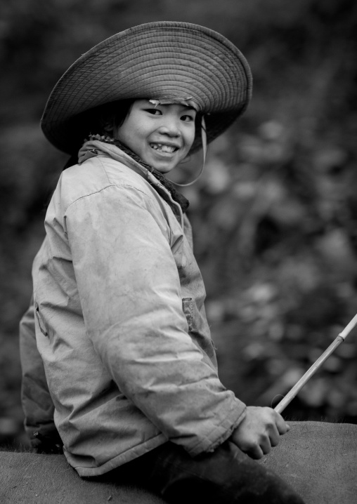 Smiling boy wearing a big hat, Sapa, Vietnam