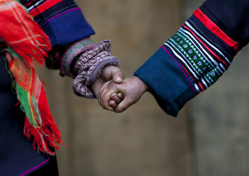 Black hmong kids holding each other s hand, Sapa, Vietnam