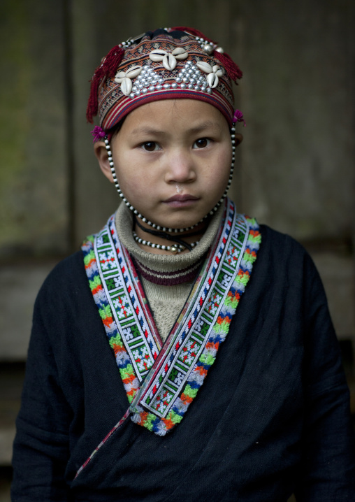 Young red dzao girl in traditional clothes, Sapa, Vietnam