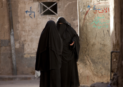 Two Veiled Women Talking In A Street Of Sanaa, Yemen